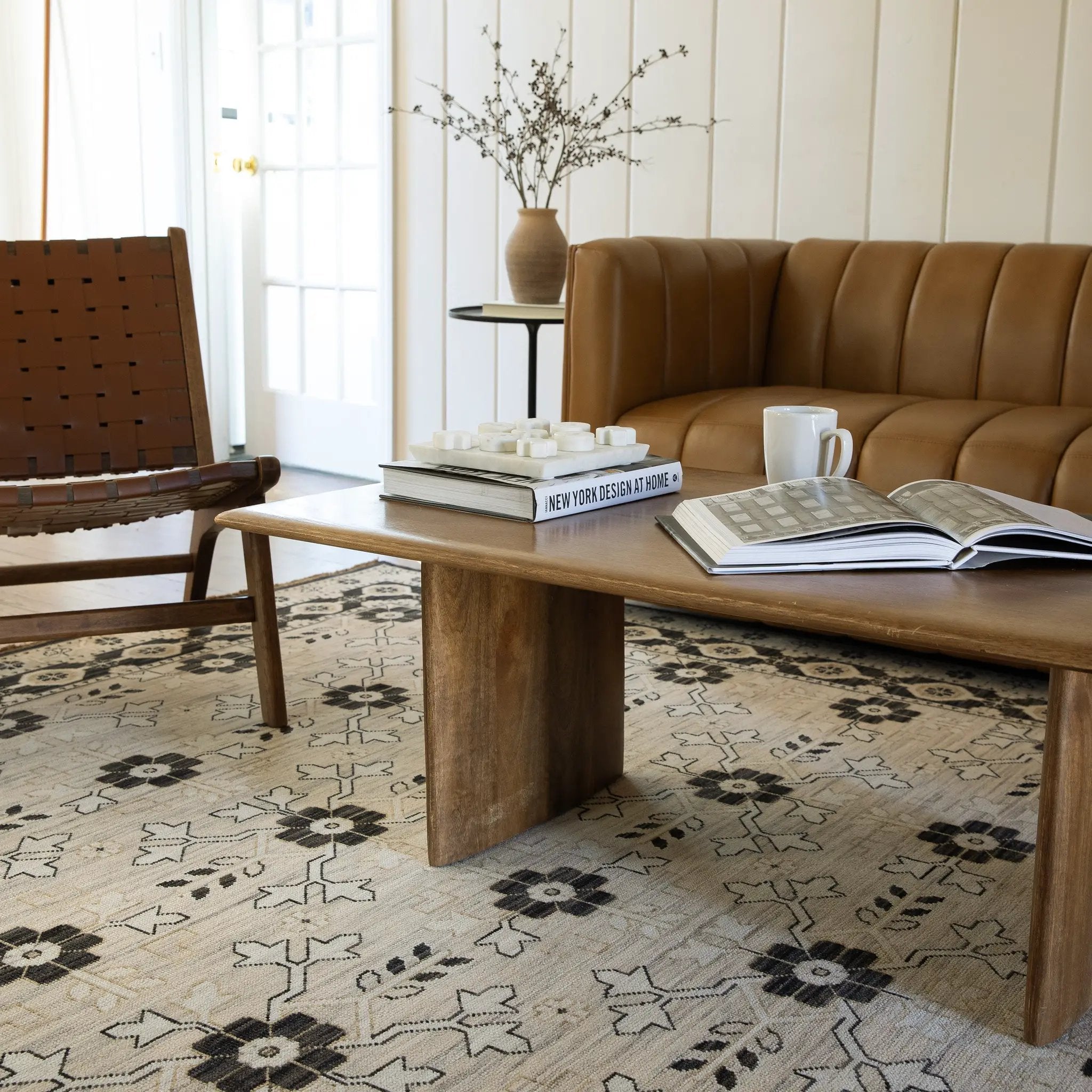 Acacia ACA09 Beige/Black statement area rug with classic pattern, beige and black contrast, earthy accent colors, and cotton fringe.