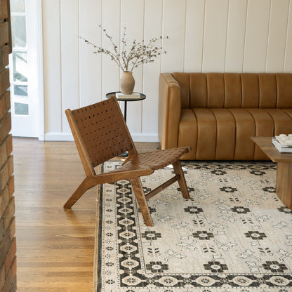 Acacia ACA09 Beige/Black statement area rug with classic pattern, beige and black contrast, earthy accent colors, and cotton fringe.