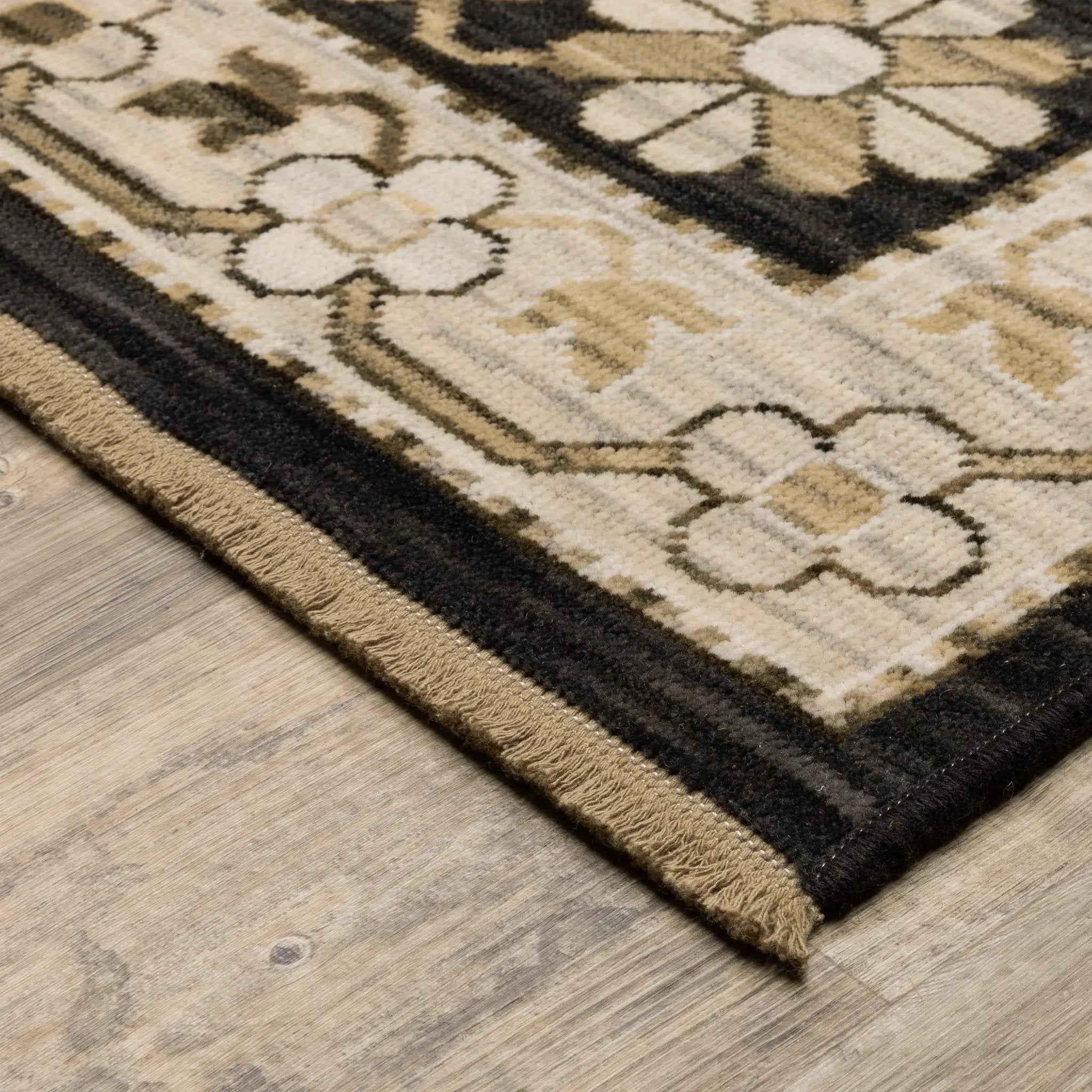 Acacia ACA10 Black/Beige traditional area rug with dramatic black and beige palette, multicolor accents, wool nylon texture, and fringe.