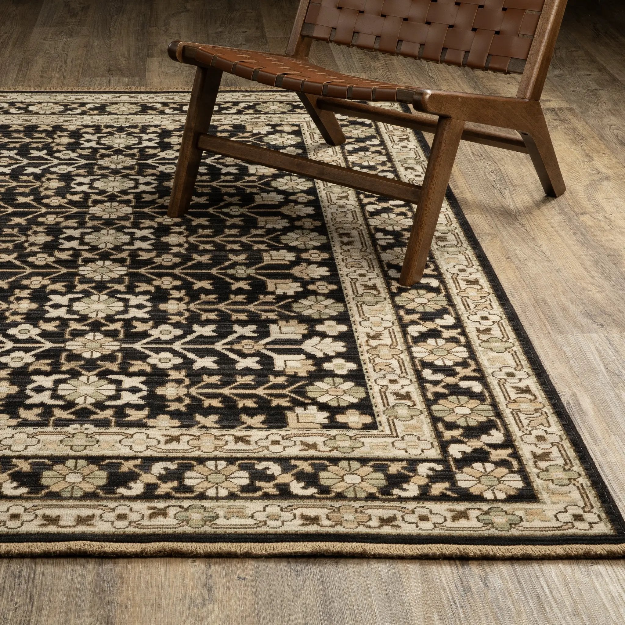 Acacia ACA10 Black/Beige traditional area rug with dramatic black and beige palette, multicolor accents, wool nylon texture, and fringe.