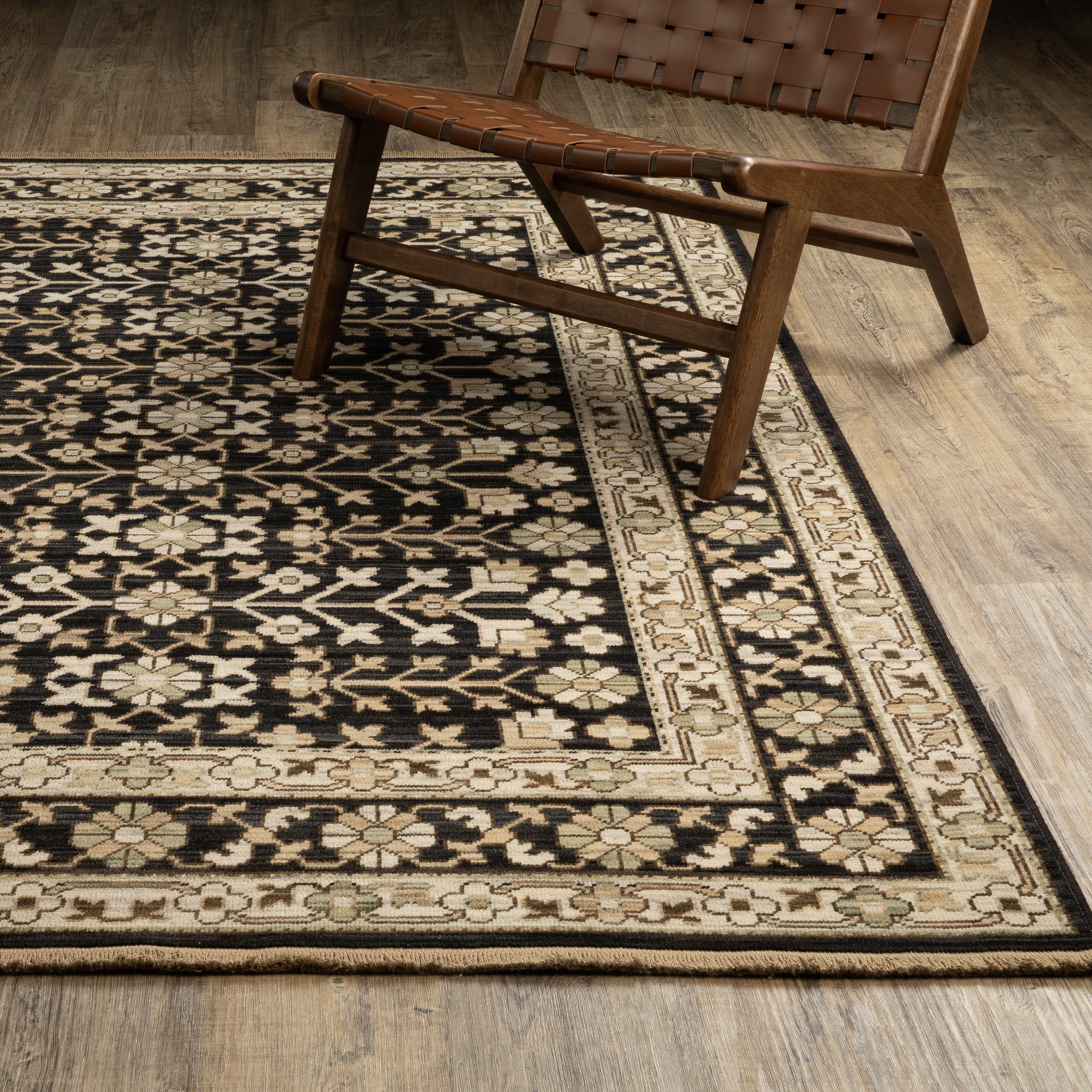 Acacia ACA10 Black/Beige traditional area rug with dramatic black and beige palette, multicolor accents, wool nylon texture, and fringe.