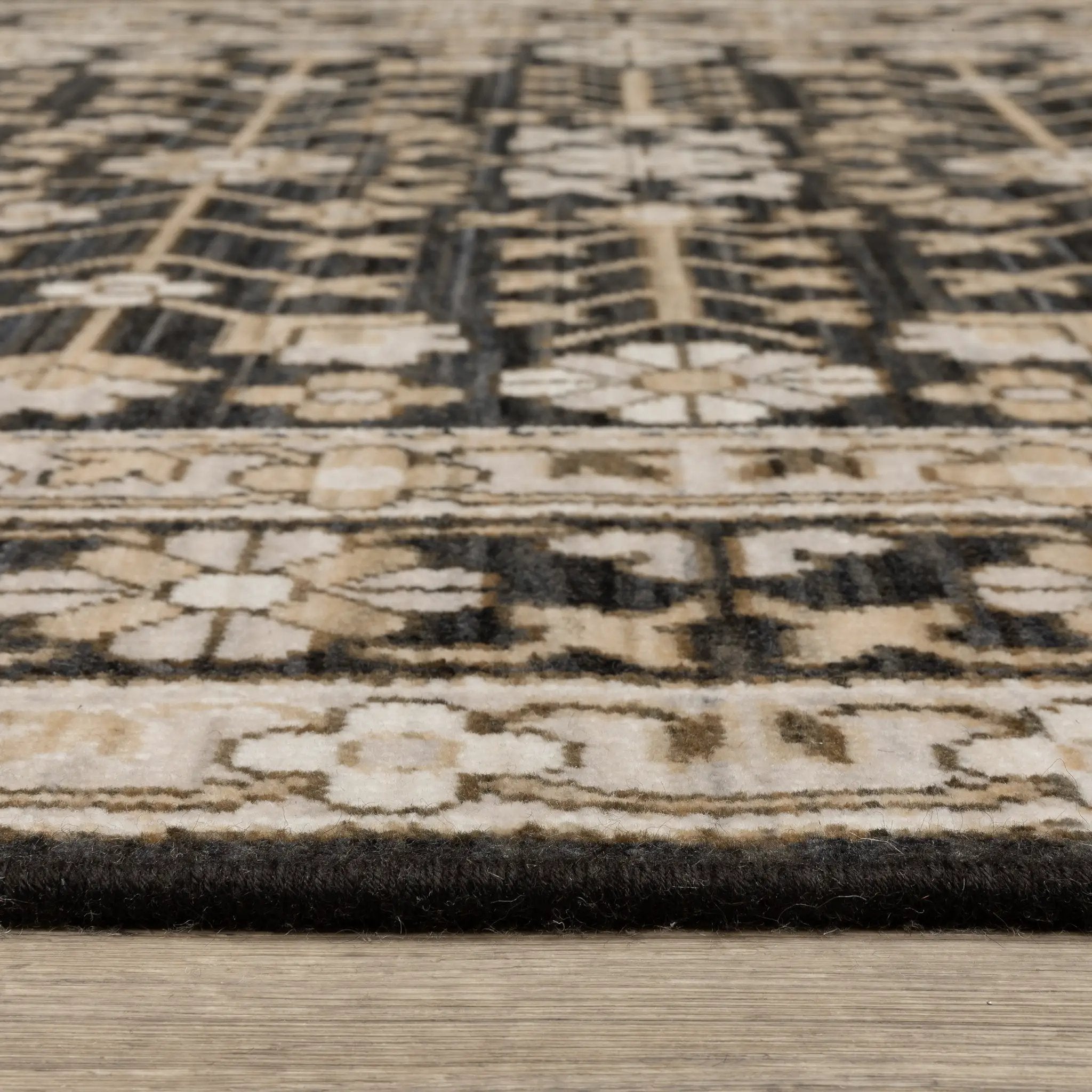 Acacia ACA10 Black/Beige traditional area rug with dramatic black and beige palette, multicolor accents, wool nylon texture, and fringe.