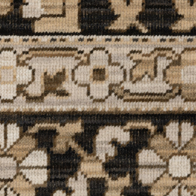 Acacia ACA10 Black/Beige traditional area rug with dramatic black and beige palette, multicolor accents, wool nylon texture, and fringe.