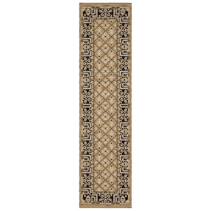 Acacia ACA12 Tan/Charcoal area rug with warm tan ground, charcoal contrast, traditional pattern detail, earthy accents, and cotton fringe.