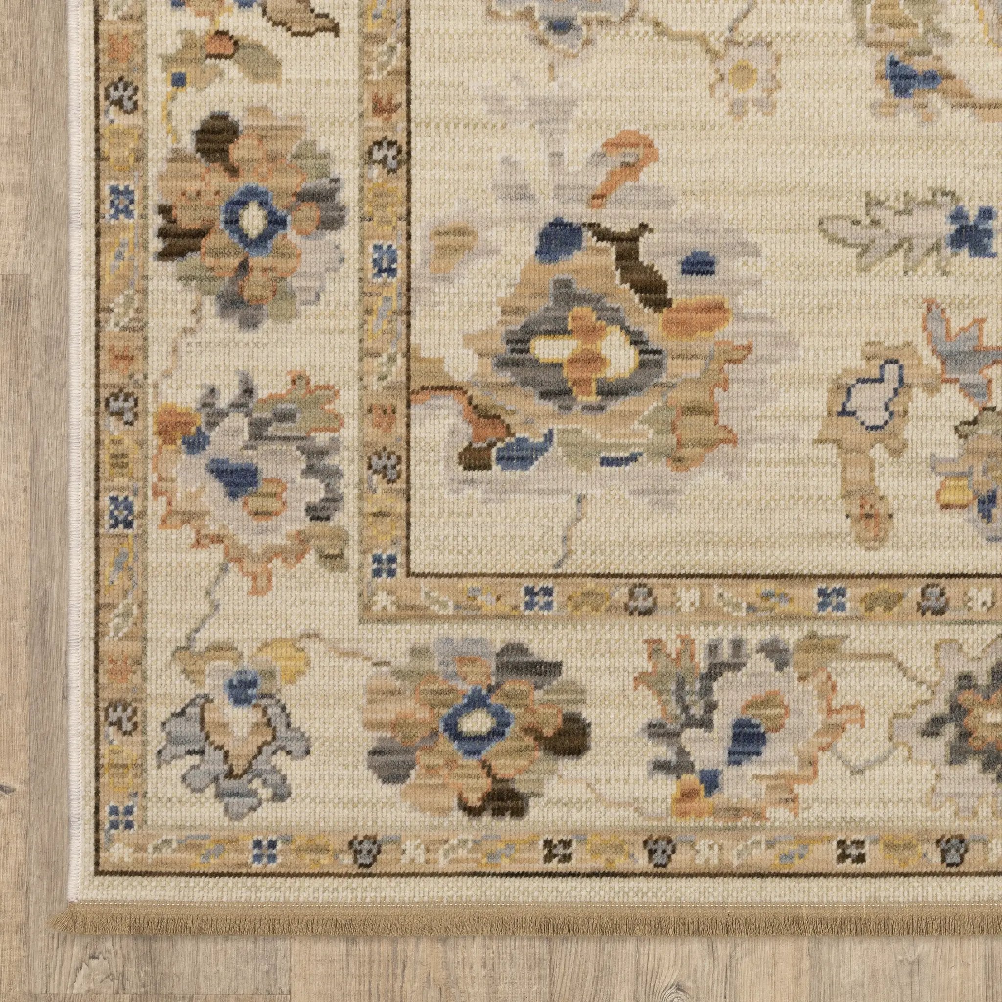 Acacia ACA13 Beige/Tan neutral traditional area rug with warm beige and tan tones, vintage-style pattern, wool nylon blend, and fringe.