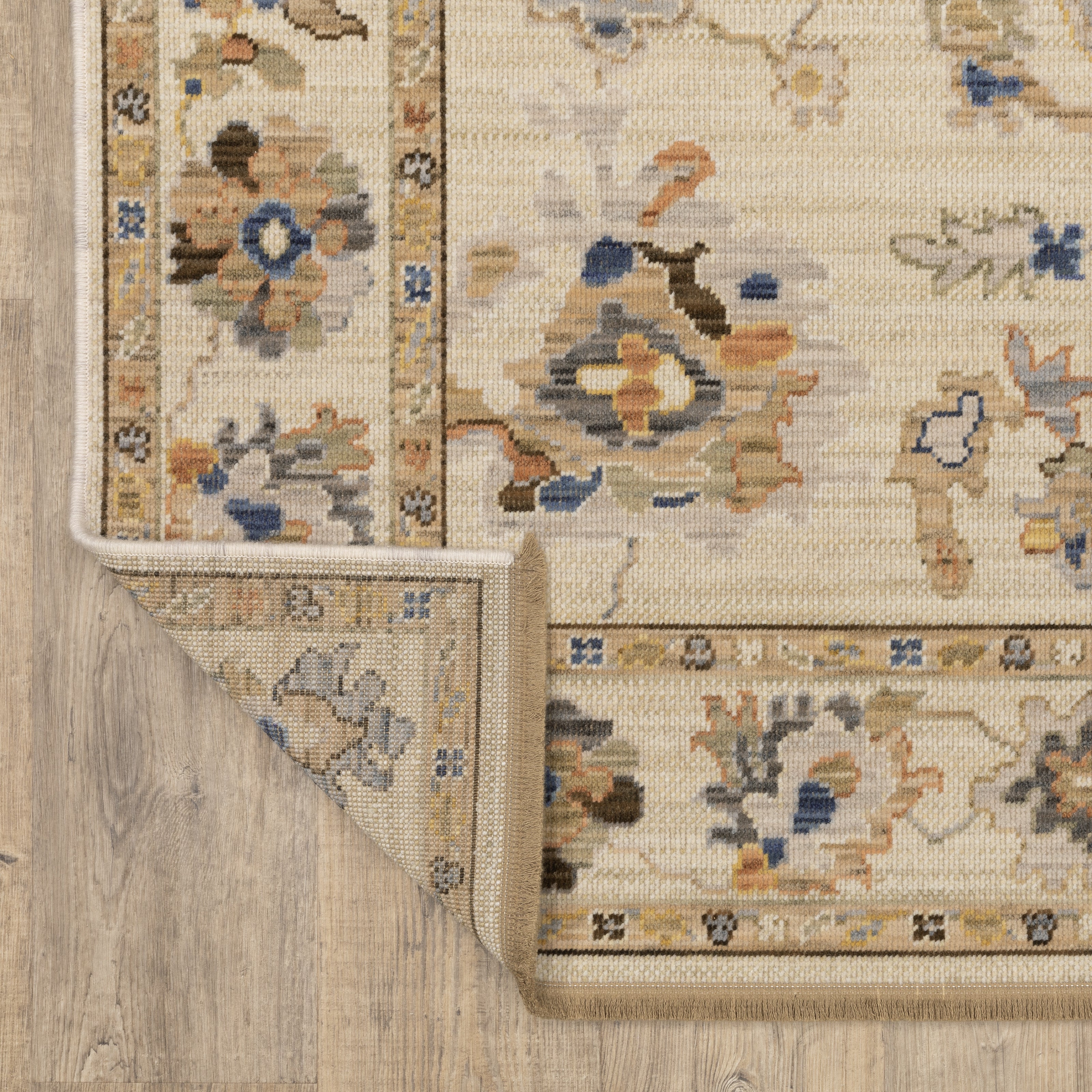 Acacia ACA13 Beige/Tan neutral traditional area rug with warm beige and tan tones, vintage-style pattern, wool nylon blend, and fringe.