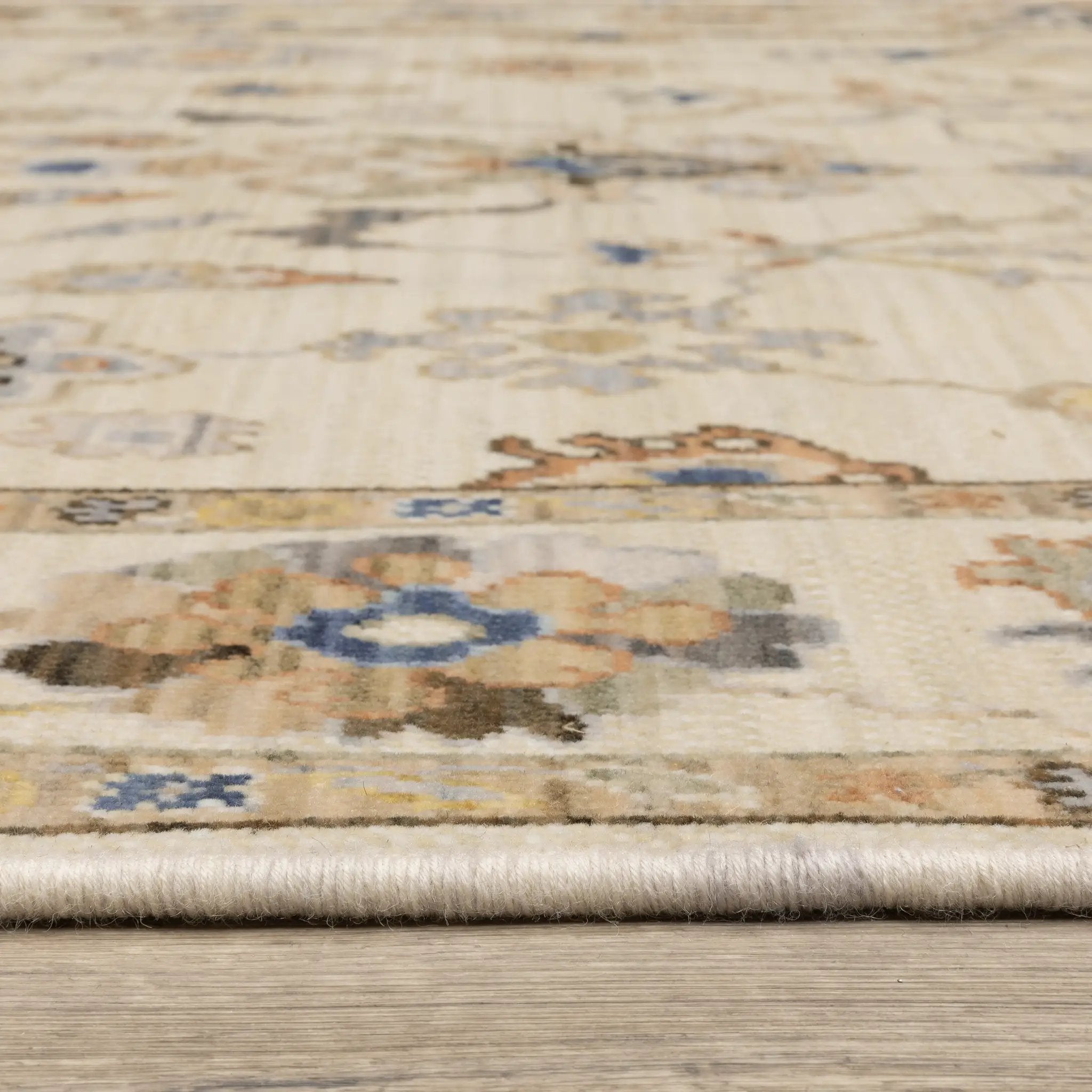 Acacia ACA13 Beige/Tan neutral traditional area rug with warm beige and tan tones, vintage-style pattern, wool nylon blend, and fringe.
