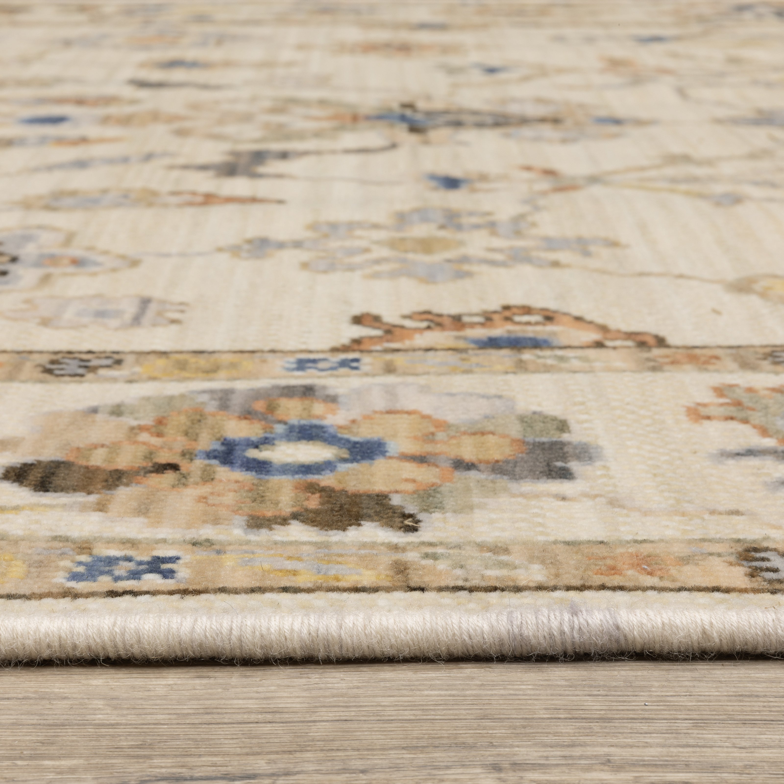 Acacia ACA13 Beige/Tan neutral traditional area rug with warm beige and tan tones, vintage-style pattern, wool nylon blend, and fringe.