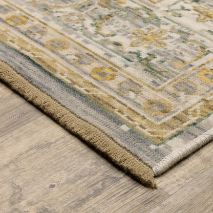 Acacia ACA14 Beige/Green nature-inspired traditional area rug with soft beige and green palette, warm accent colors, and cotton fringe.