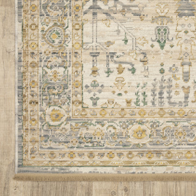Acacia ACA14 Beige/Green nature-inspired traditional area rug with soft beige and green palette, warm accent colors, and cotton fringe.