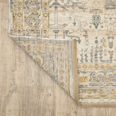Acacia ACA14 Beige/Green nature-inspired traditional area rug with soft beige and green palette, warm accent colors, and cotton fringe.