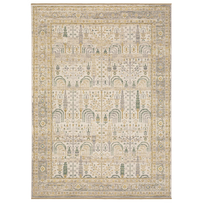 Acacia ACA14 Beige/Green nature-inspired traditional area rug with soft beige and green palette, warm accent colors, and cotton fringe.