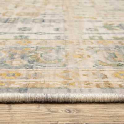 Acacia ACA14 Beige/Green nature-inspired traditional area rug with soft beige and green palette, warm accent colors, and cotton fringe.
