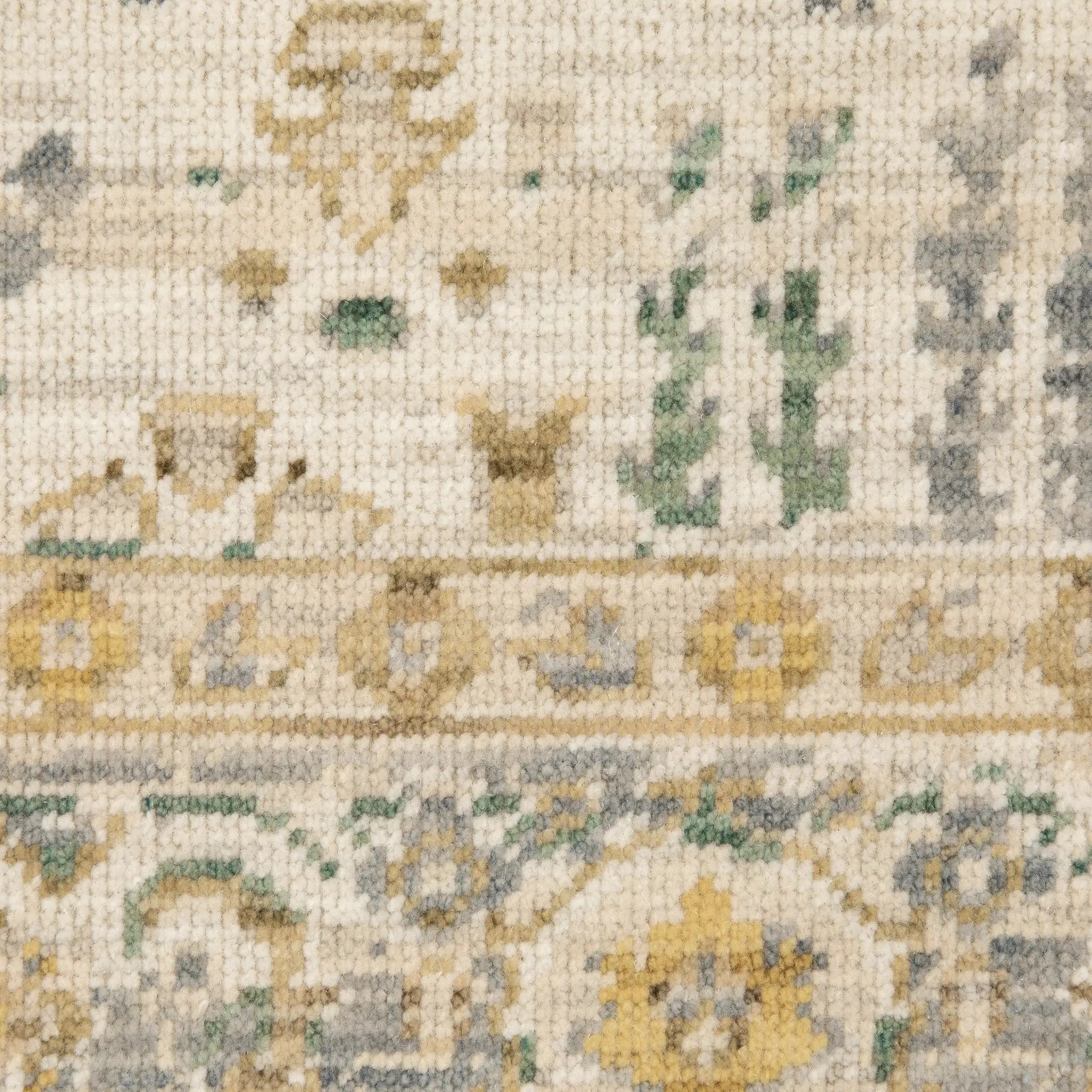 Acacia ACA14 Beige/Green nature-inspired traditional area rug with soft beige and green palette, warm accent colors, and cotton fringe.