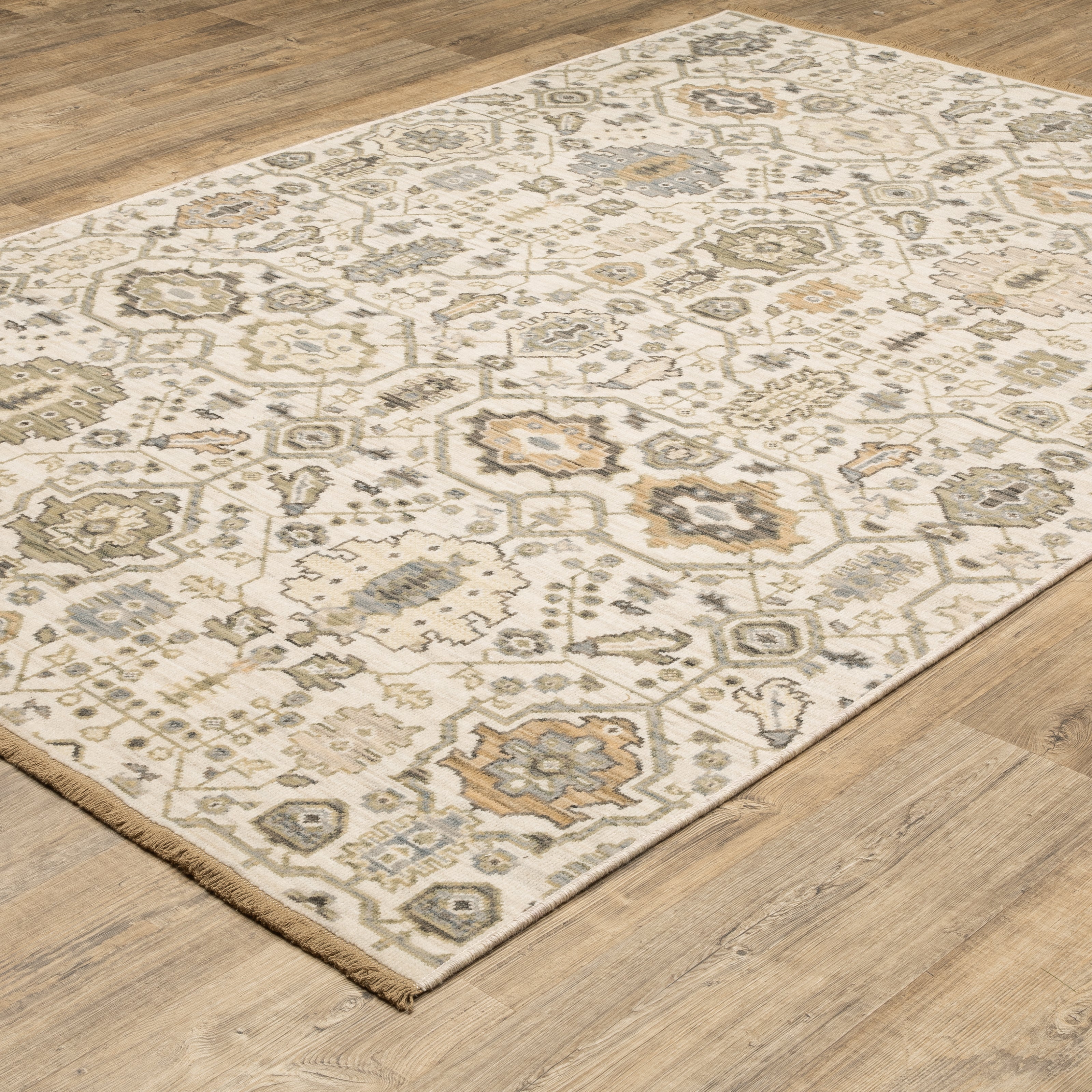 Acacia ACA16 Ivory/Gold elegant traditional area rug with refined ivory and gold palette, subtle accent colors, and cotton fringe.