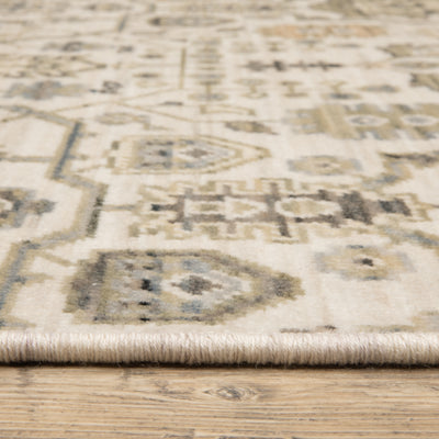 Acacia ACA16 Ivory/Gold elegant traditional area rug with refined ivory and gold palette, subtle accent colors, and cotton fringe.