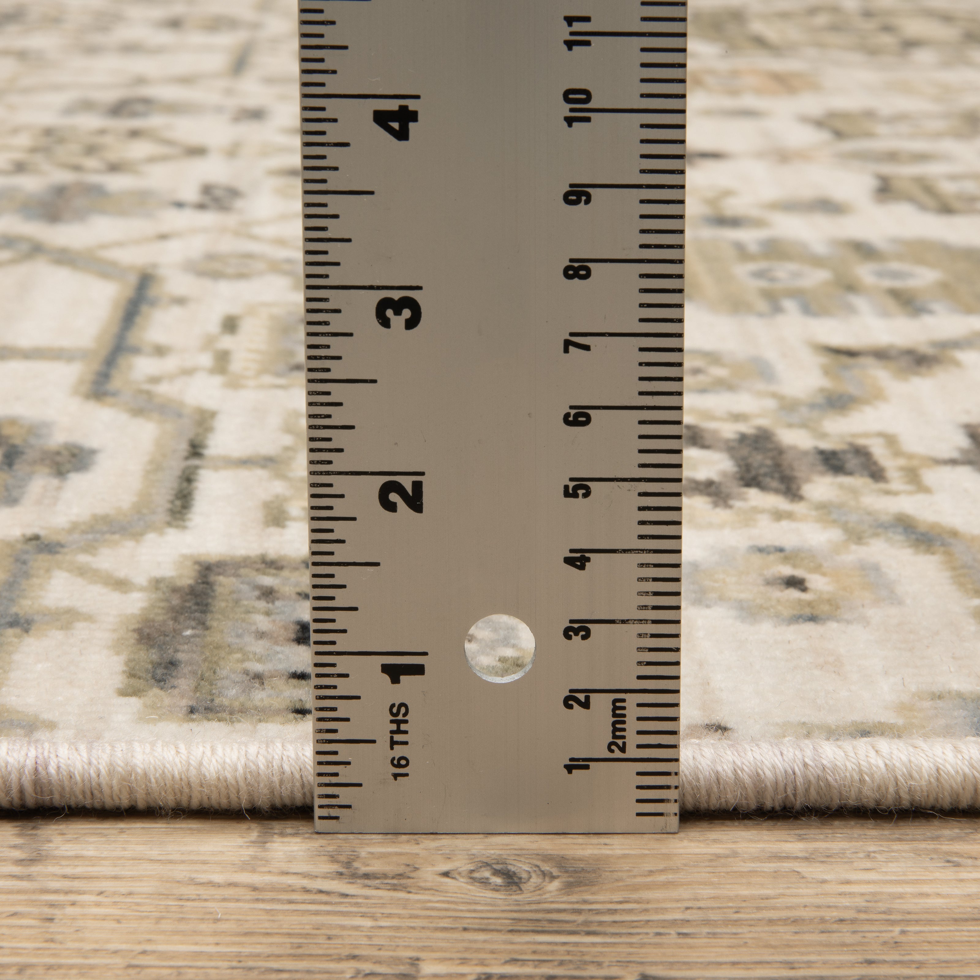 Acacia ACA16 Ivory/Gold elegant traditional area rug with refined ivory and gold palette, subtle accent colors, and cotton fringe.