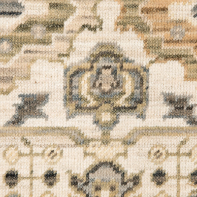 Acacia ACA16 Ivory/Gold elegant traditional area rug with refined ivory and gold palette, subtle accent colors, and cotton fringe.