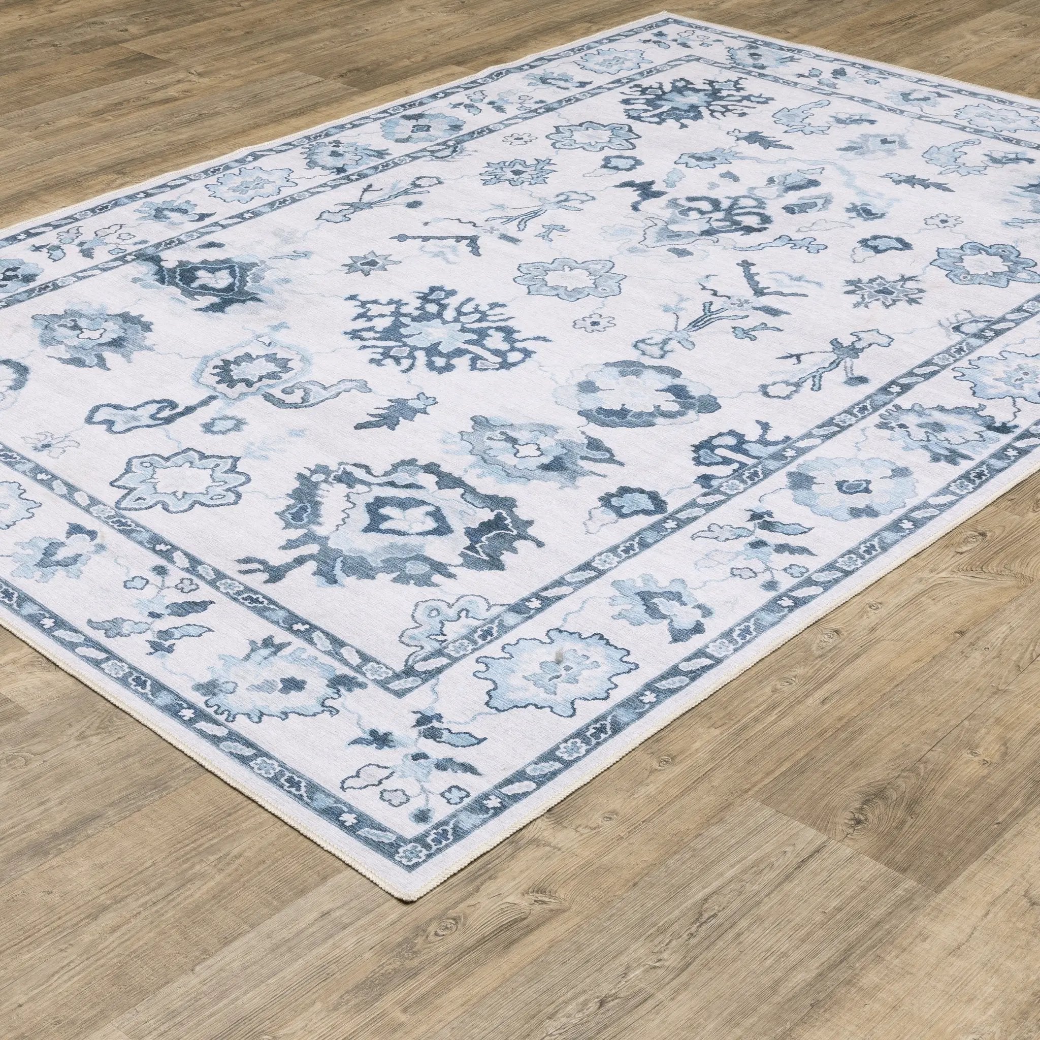 Addison ADD02 Ivory/ Blue Area Rug by Oriental Weavers