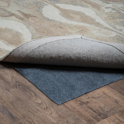 All Purpose Reversible 0004E Grey Rug Pad, grey reversible rug pad with low-profile needle punch construction for hard floors or carpet.