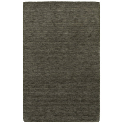 Aniston 27102 Charcoal Area Rug, charcoal solid wool area rug with heathered texture and tailored handwoven surface.