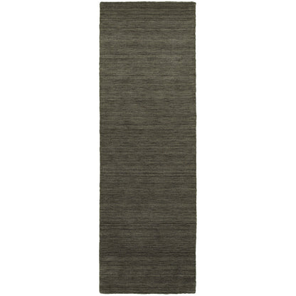 Aniston 27102 Charcoal Area Rug, charcoal solid wool area rug with heathered texture and tailored handwoven surface.
