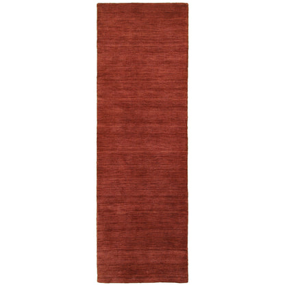 Aniston 27103 Rust Area Rug, rust solid wool area rug with heathered texture and warm handwoven surface.