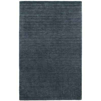 Aniston 27106 Navy Area Rug, navy solid wool area rug with heathered tonal variation and handwoven texture.