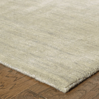 Aniston 27107 Beige Area Rug, beige solid wool area rug with subtle heathered texture and handwoven surface.