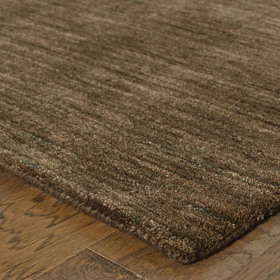 Aniston 27109 Brown Area Rug, brown solid wool area rug with heathered texture and natural handwoven surface.