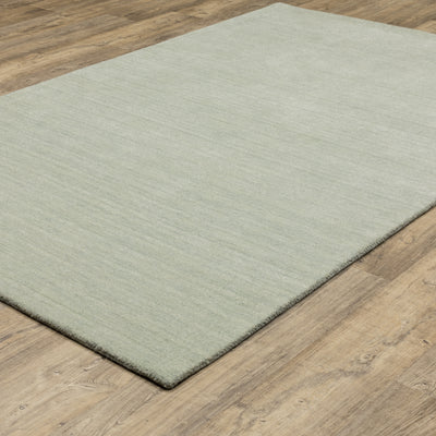 Aniston II 27115 Silver Area Rug, silver solid wool area rug with heathered texture and plush hand-tufted surface.
