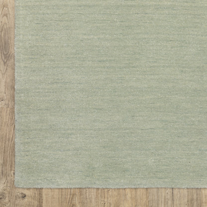 Aniston II 27115 Silver Area Rug, silver solid wool area rug with heathered texture and plush hand-tufted surface.