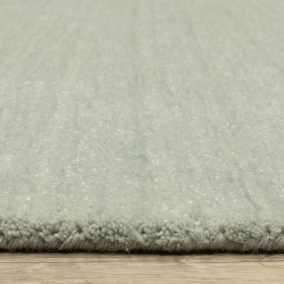 Aniston II 27115 Silver Area Rug, silver solid wool area rug with heathered texture and plush hand-tufted surface.