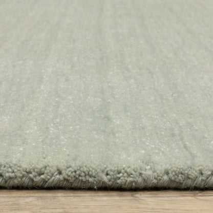 Aniston II 27115 Silver Area Rug, silver solid wool area rug with heathered texture and plush hand-tufted surface.