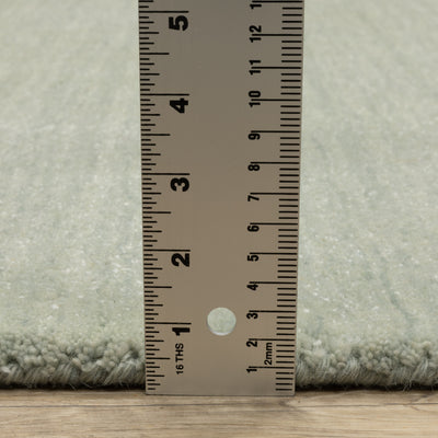 Aniston II 27115 Silver Area Rug, silver solid wool area rug with heathered texture and plush hand-tufted surface.