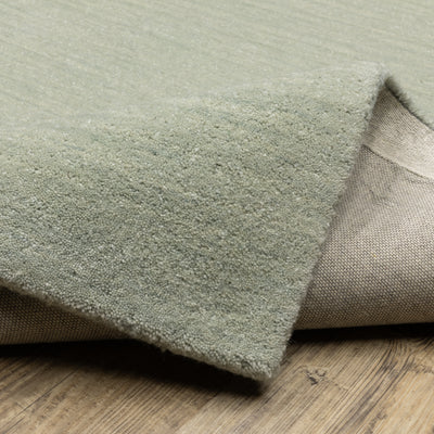 Aniston II 27115 Silver Area Rug, silver solid wool area rug with heathered texture and plush hand-tufted surface.