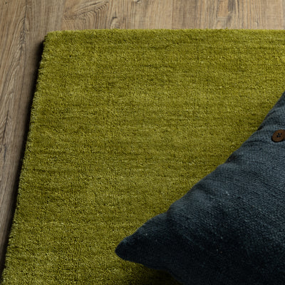 Aniston II 27116 Olive Green Area Rug, olive green solid wool area rug with heathered texture and plush hand-tufted surface.