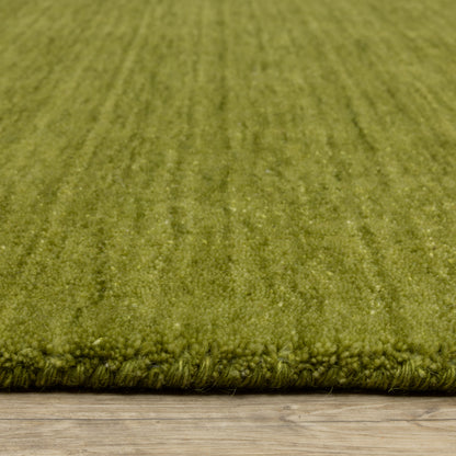 Aniston II 27116 Olive Green Area Rug, olive green solid wool area rug with heathered texture and plush hand-tufted surface.
