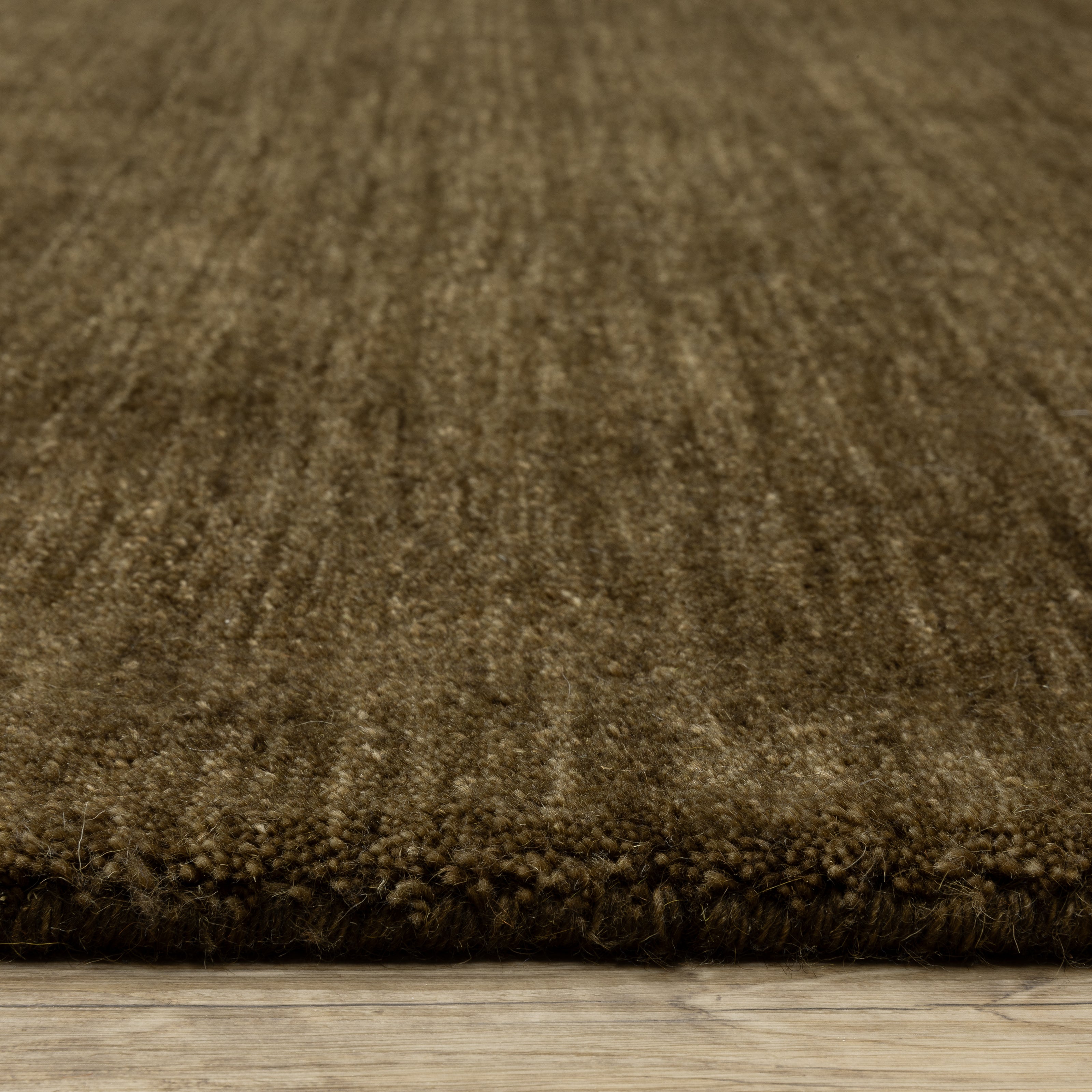 Aniston II 27117 Brown Area Rug, brown solid wool area rug with heathered texture and plush hand-tufted surface.