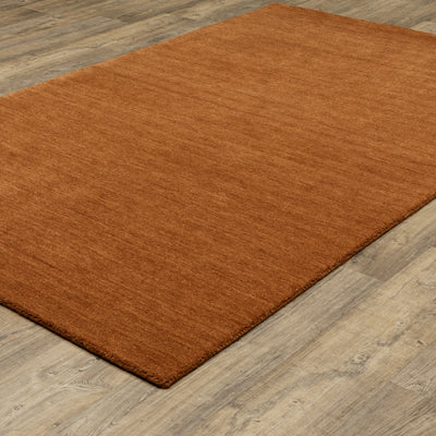 Aniston II 27118 Rust Area Rug, rust solid wool area rug with heathered texture and plush hand-tufted surface.