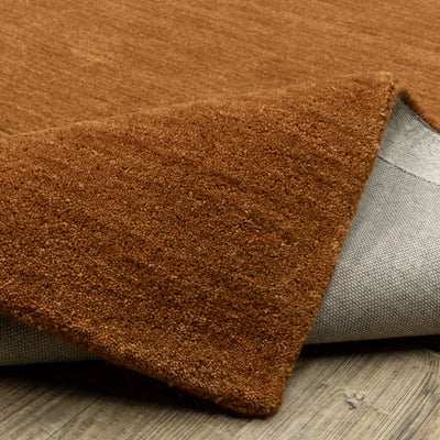 Aniston II 27118 Rust Area Rug, rust solid wool area rug with heathered texture and plush hand-tufted surface.