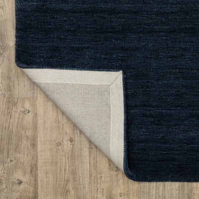 Aniston II 27119 Navy Area Rug, navy solid wool area rug with heathered texture and plush hand-tufted surface.