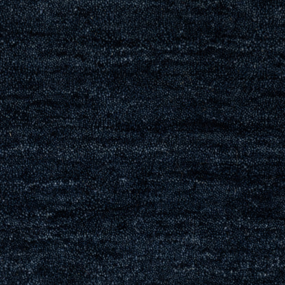 Aniston II 27119 Navy Area Rug, navy solid wool area rug with heathered texture and plush hand-tufted surface.