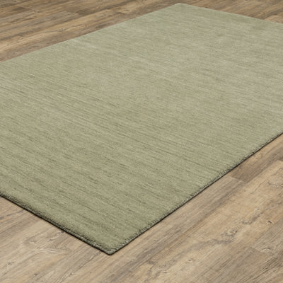 Aniston II 27120 Sage Green Area Rug, sage green solid wool area rug with heathered texture and plush hand-tufted surface.