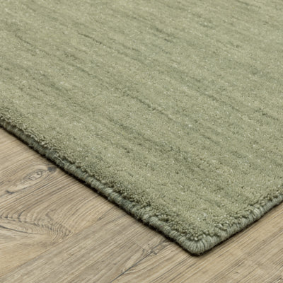 Aniston II 27120 Sage Green Area Rug, sage green solid wool area rug with heathered texture and plush hand-tufted surface.