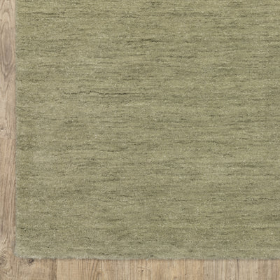 Aniston II 27120 Sage Green Area Rug, sage green solid wool area rug with heathered texture and plush hand-tufted surface.