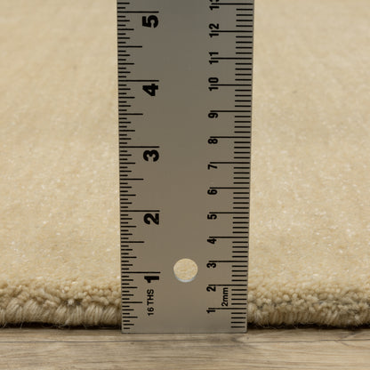 Aniston II 27122 Beige Area Rug, beige solid wool area rug with heathered texture and plush hand-tufted surface.