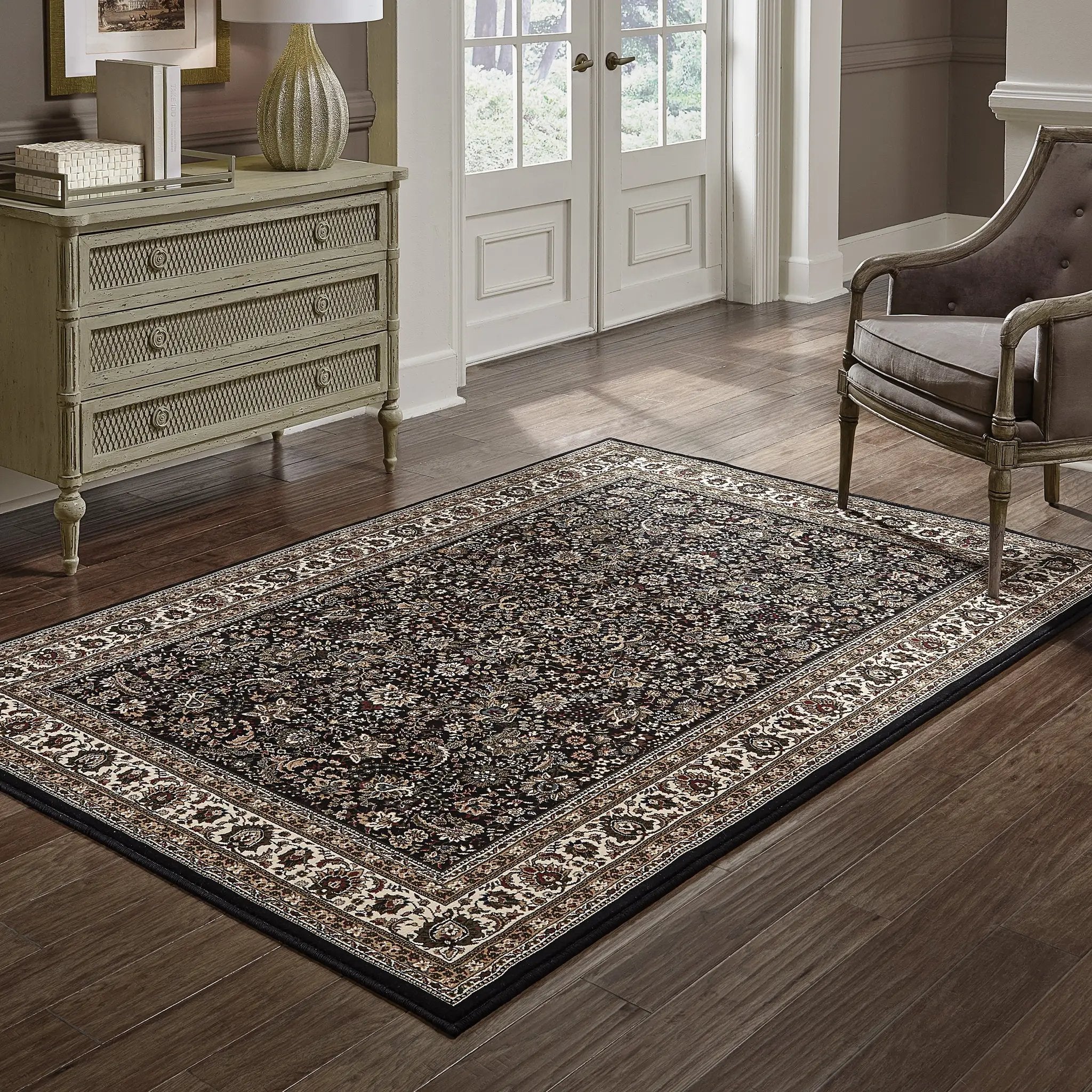 Ariana 213K8 Black/ Ivory Area Rug by Oriental Weavers