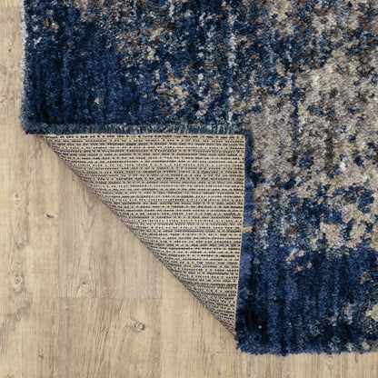 Oriental Weavers Aspen 2060L plush shag rug featuring abstract pattern in blue/ grey tones