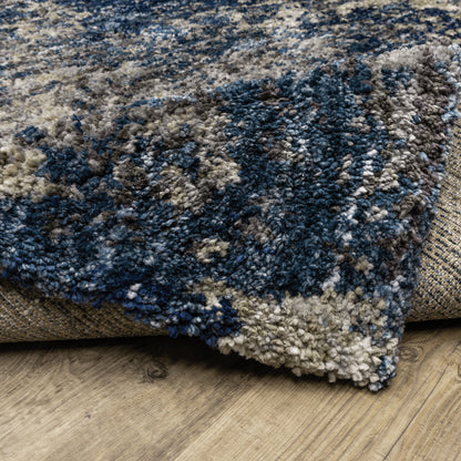 Oriental Weavers Aspen 2060L plush shag rug featuring abstract pattern in blue/ grey tones